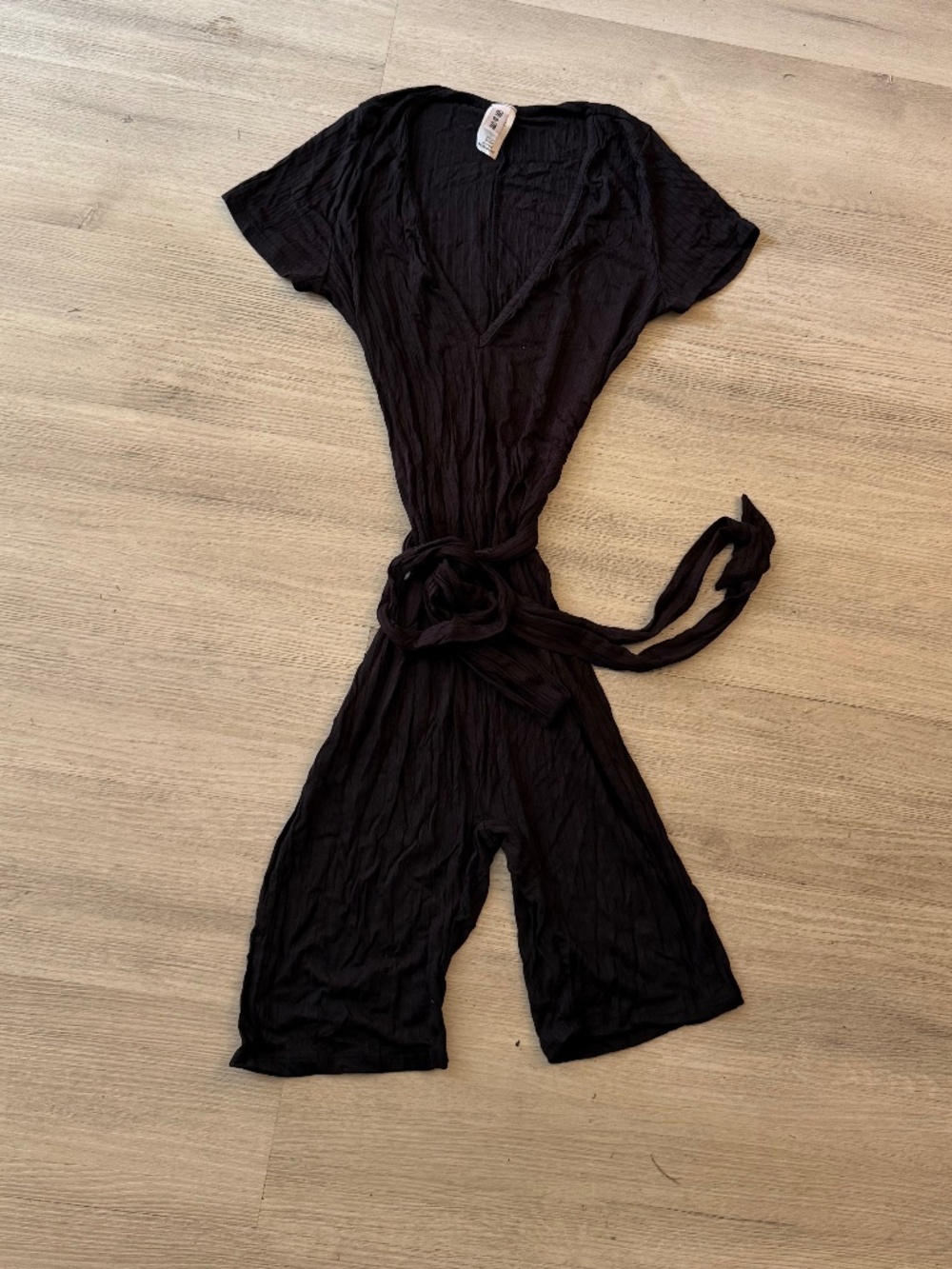 Black v neck romper with waist tie